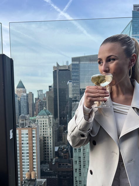 Photos of the Empire State Building and a dirty martinin at the Skylark Rooftop Bar in NYC.