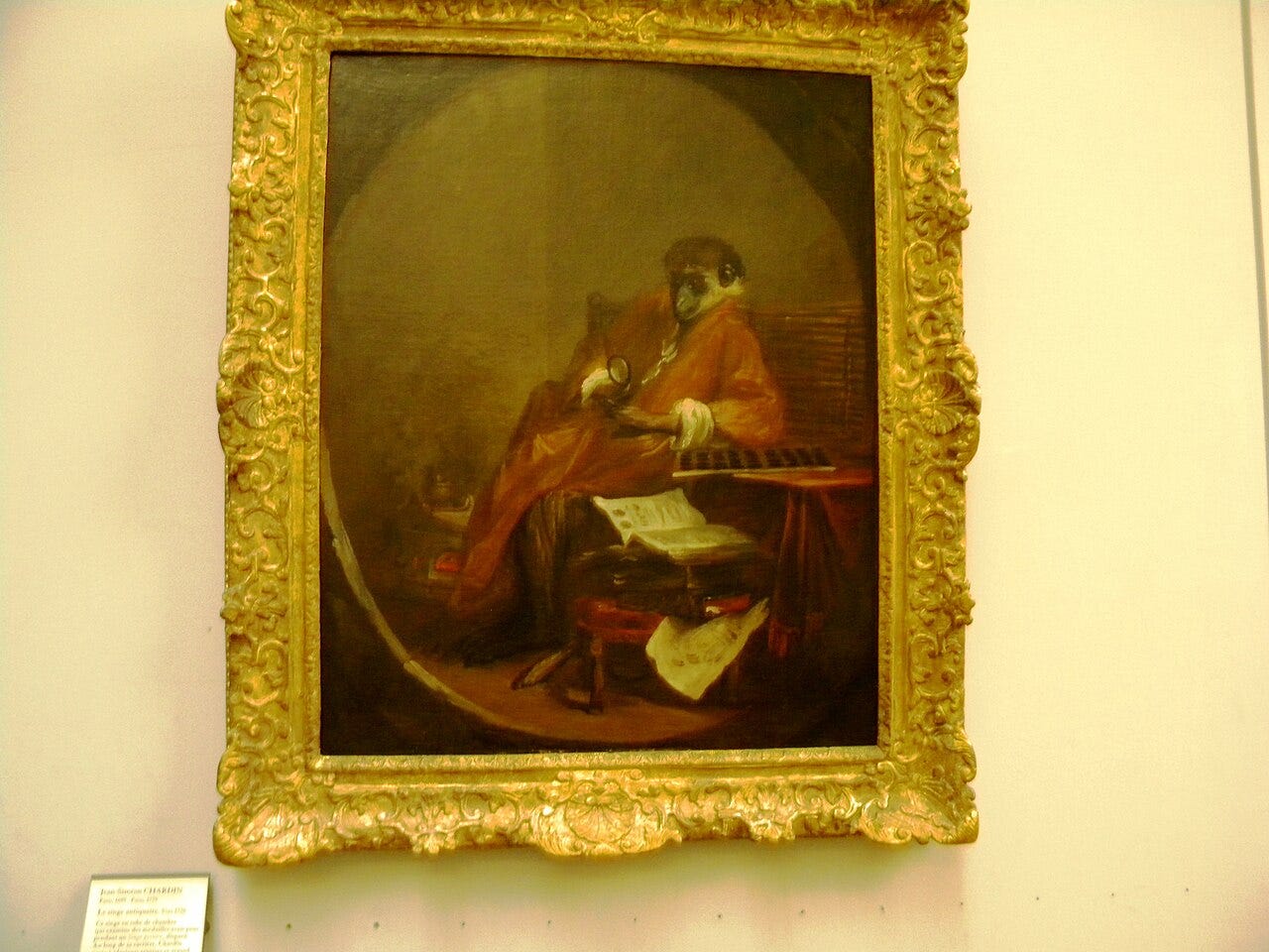 Monkey seated at an easel Monkey seated at an easel
