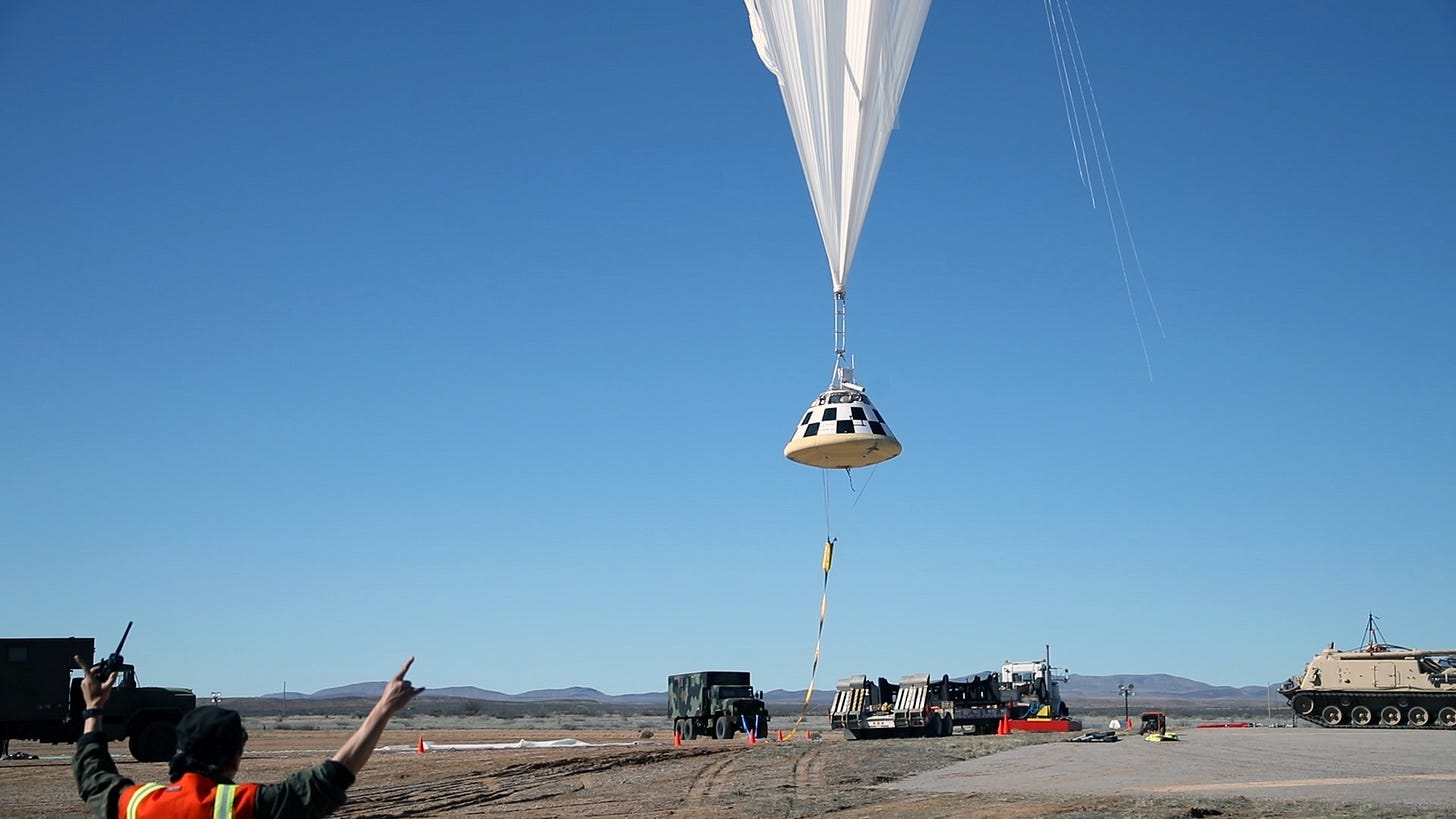 A boilerplate CST-100 Starliner is lifted skyward by a balloon for a drop test of the Starliner's parachute system. Boeing, which is building the Starliner, conducted the test in White Sands, New Mexico, as part of the testing campaign for certification by NASA's Commercial Crew Program. Photo credit: Boeing A boilerplate CST-100 Starliner is lifted skyward by a balloon for a drop test of the Starliner's parachute system. Boeing, which is building the Starliner, conducted the test in White Sands, New Mexico, as part of the testing campaign for certification by NASA's Commercial Crew Program. Photo credit: Boeing