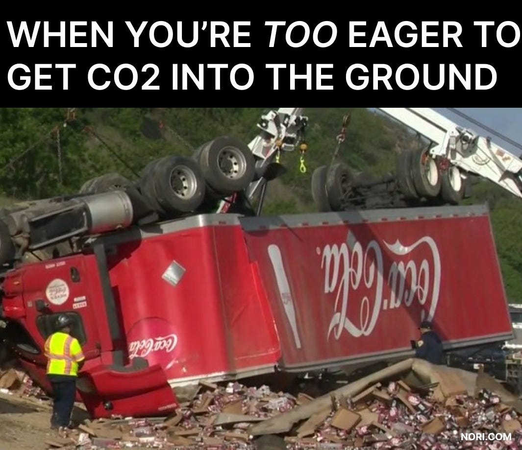 An overturned red Coca-Cola truck with its cargo spilled across the road, under the heading "When you're too eager to get CO2 into the ground".