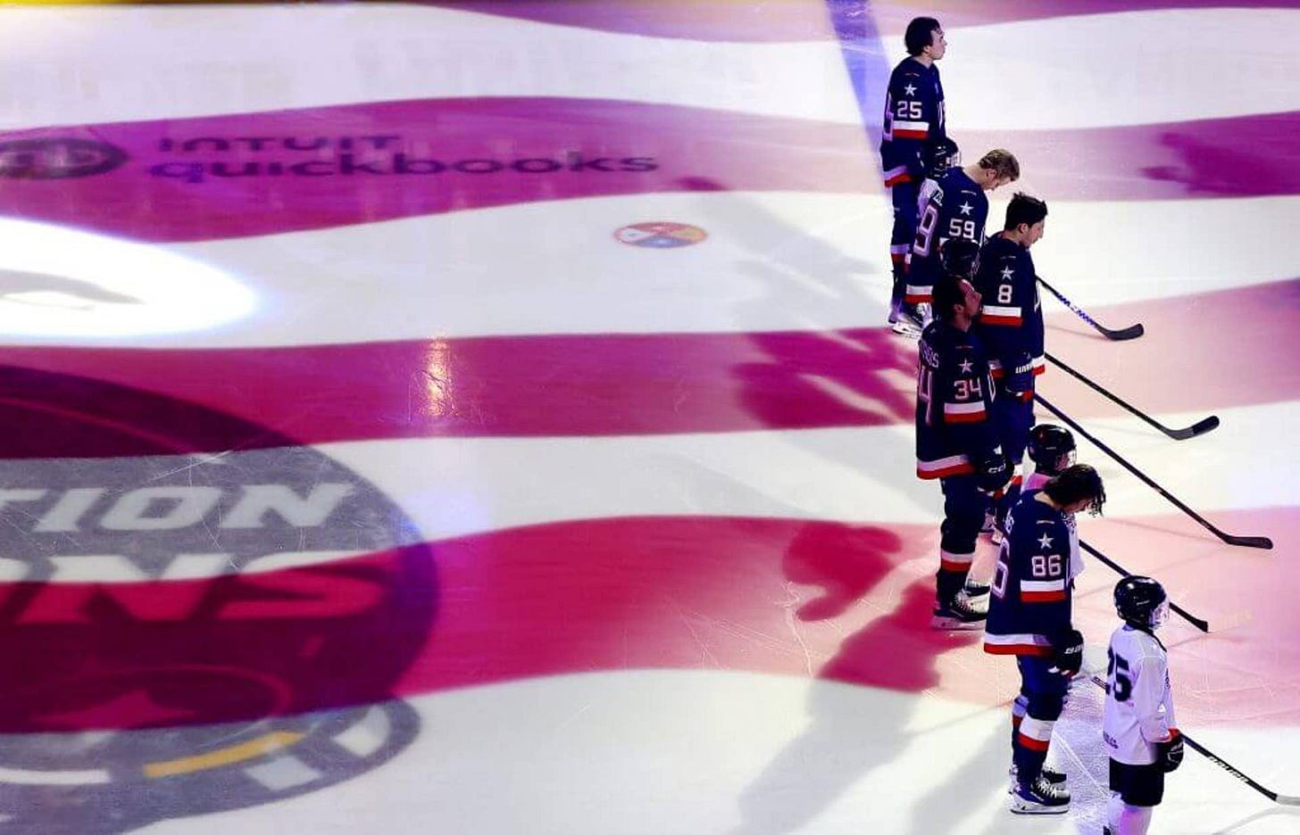 MONTREAL, QUEBEC - FEBRUARY 13: (Top-Bottom) Charlie McAvoy #25, Jake Guentzel #59, Zach Werenski #8, Auston Matthews #34 and Jack Hughes #86 of Team United States stand at their blueline during the singing of the United Sates national anthem before the 4 Nations Face-Off game between the United States and Finland at Bell Centre on February 13, 2025 in Montreal, Quebec. (Photo by Vitor Munhoz/4NFO/World Cup of Hockey via Getty Images)
