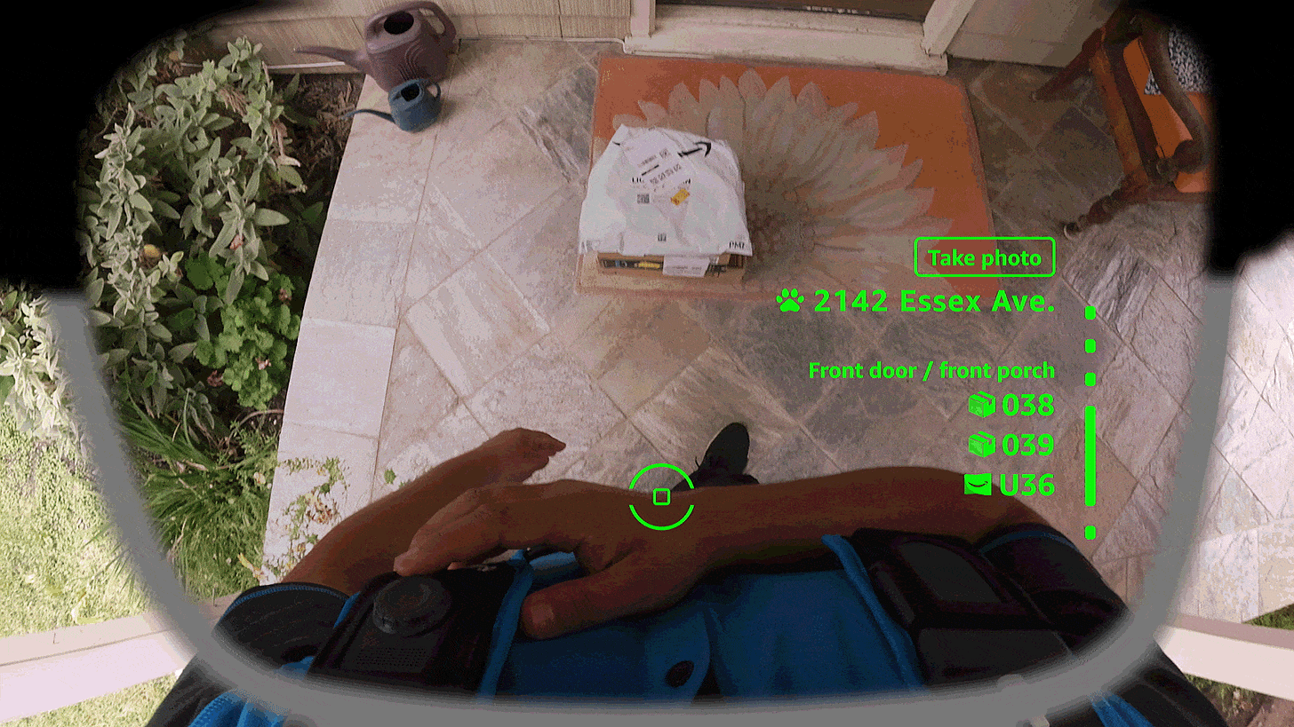 Gif of Amazon Delivery driver using the wearable glasses and harness to deliver a package