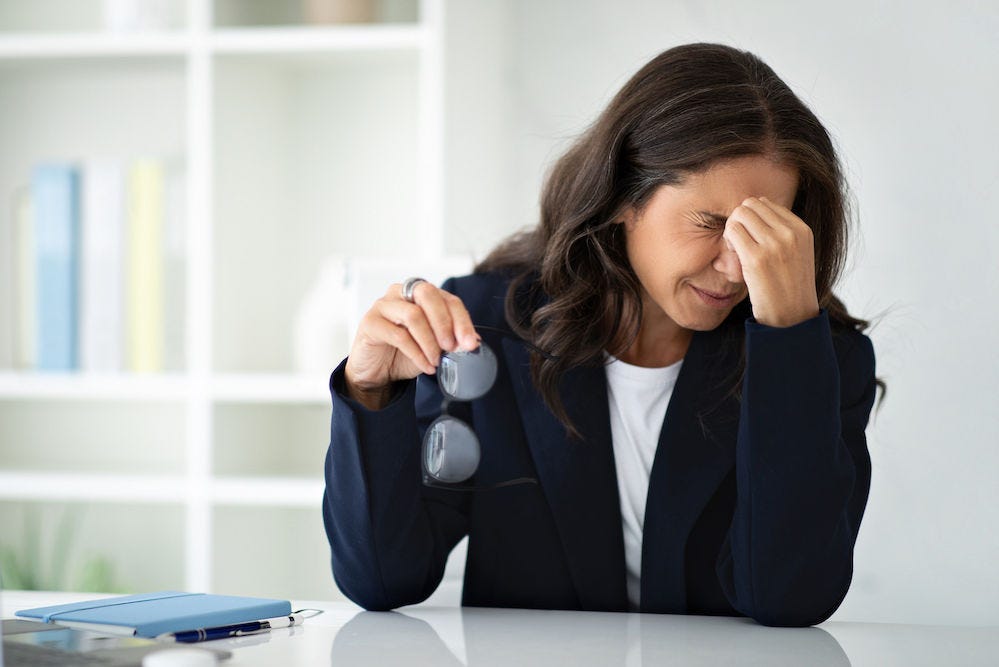A woman feels uncertain if she's experiencing workplace discrimination