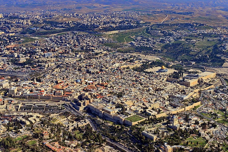 An aerial view of a city

Description automatically generated