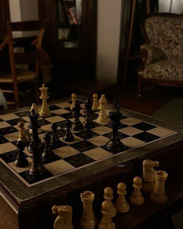 This may contain: a chess board with several pieces on it