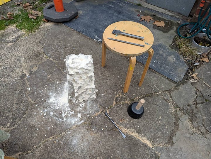 Michal Plis carving in lime stone abstract piece