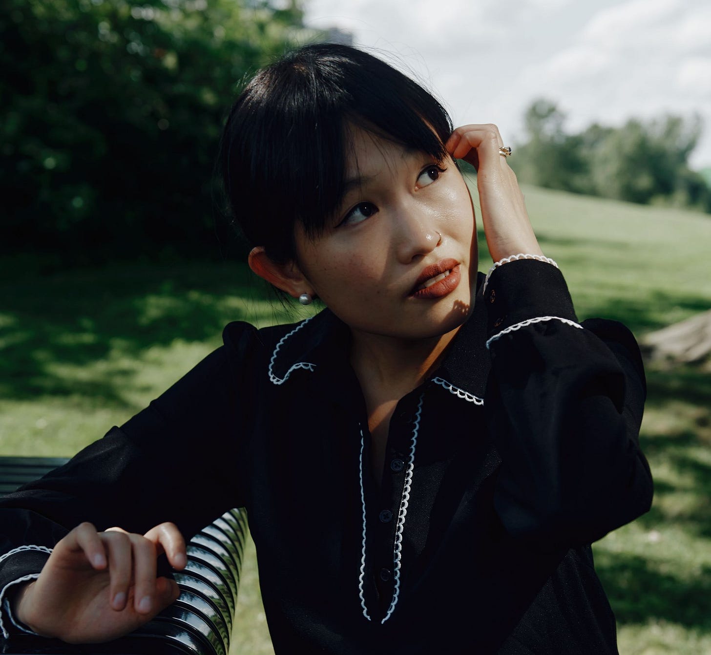 A photograph of the author R. F. Kuang