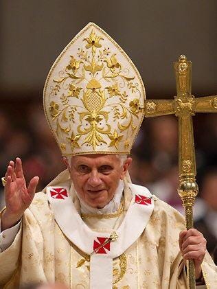 Let's all take a minute to appreciate the Pope's brilliant hat ensemble ...