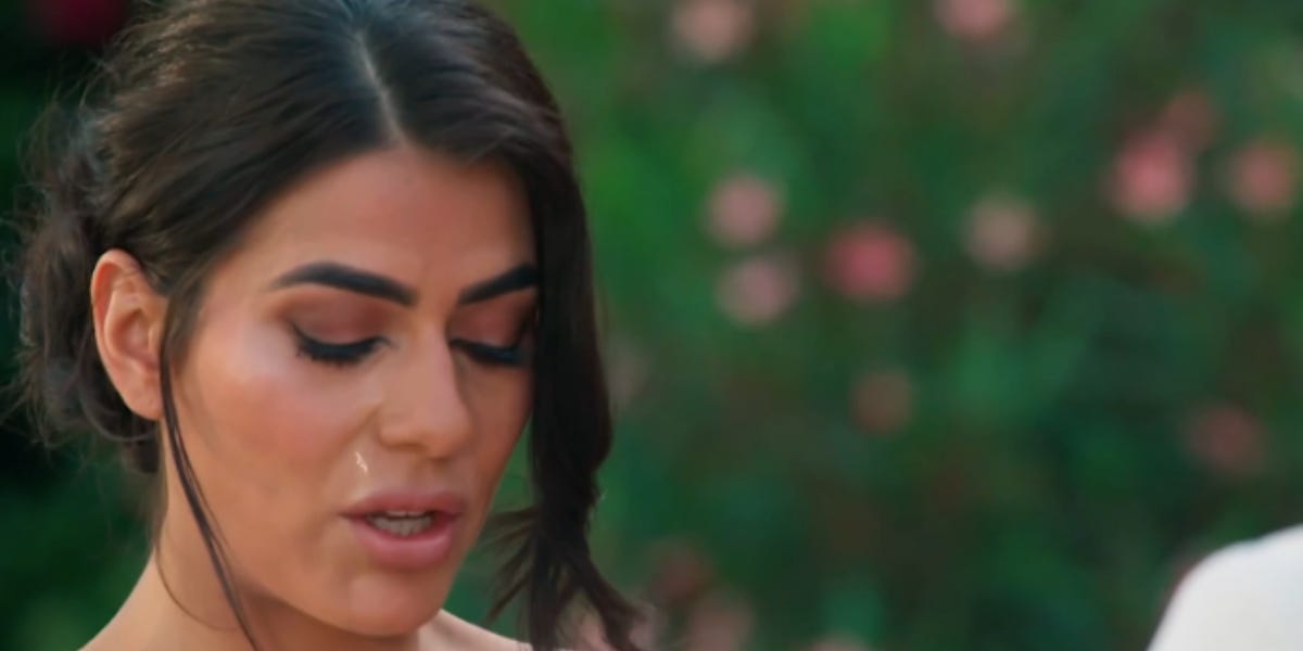 Carina sheds a tear as she reads out her final vows