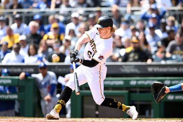 Jack Suwinski of the Pittsburgh Pirates hits an RBI single during the first inning against the Los Angeles Dodgers at PNC Park on April 27, 2023 in...