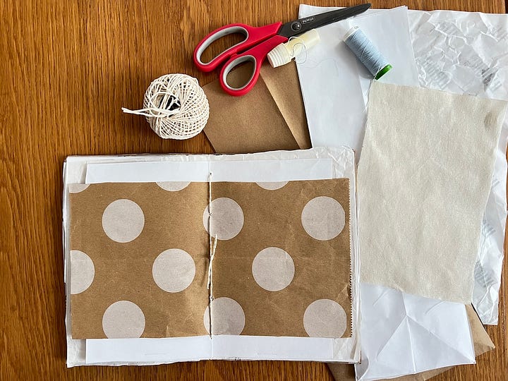 Various mixed media materials to create a handmade sketchbook