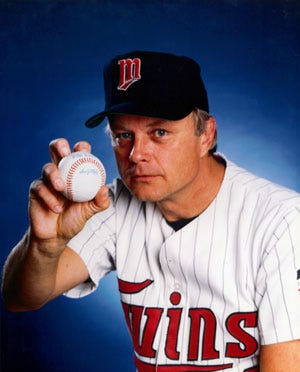 Niekro demonstrates the knuckleball grip.