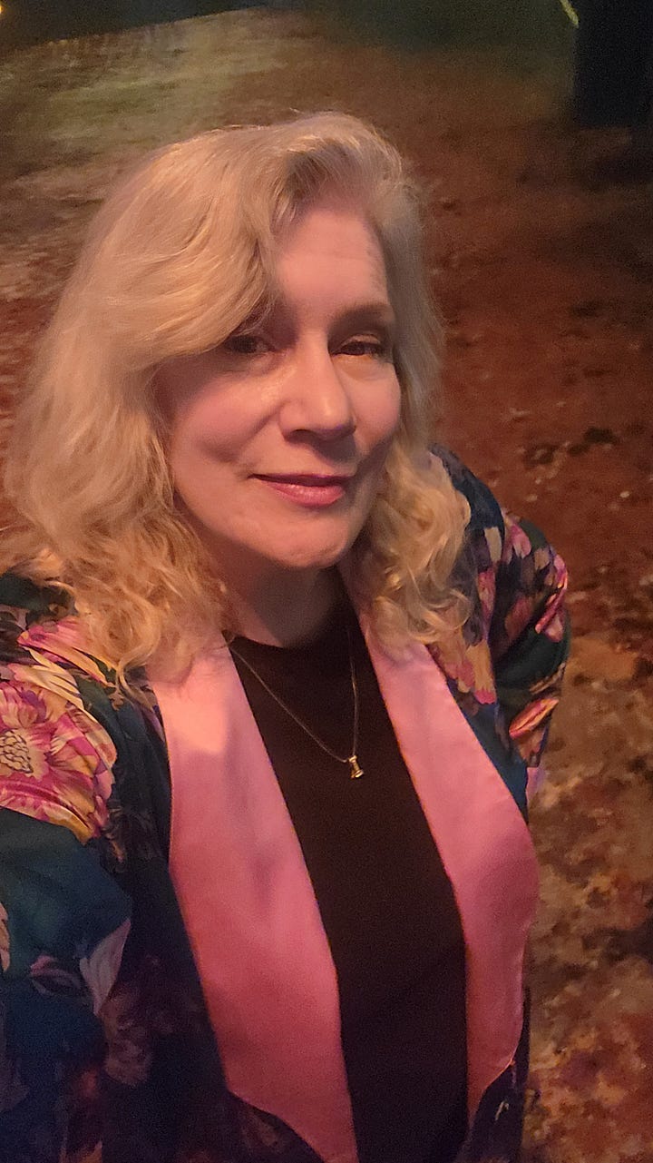 I'm in a vintage silk dressing gown and paper dolls are from Arabella Grayson's collection.