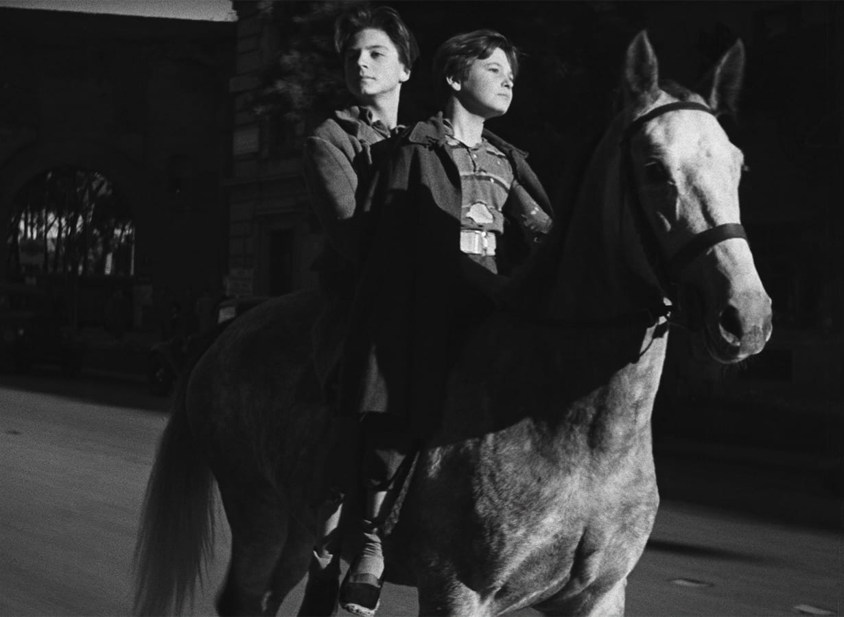 Shoeshine | Still features two Italian boys on horseback.