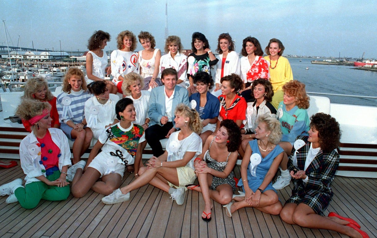 Donald Trump poses with competing State Misses on his yacht in Atlantic City, September 4, 1988. Donald Trump poses with competing State Misses on his yacht in Atlantic City, September 4, 1988.