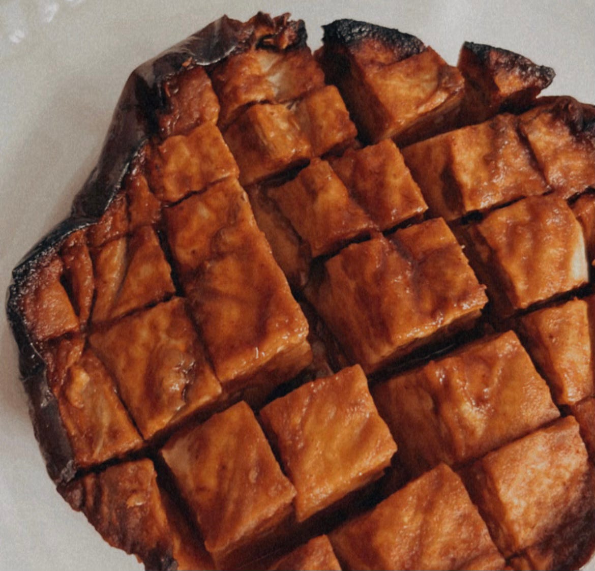 scored roasted eggplant with gochujang paste