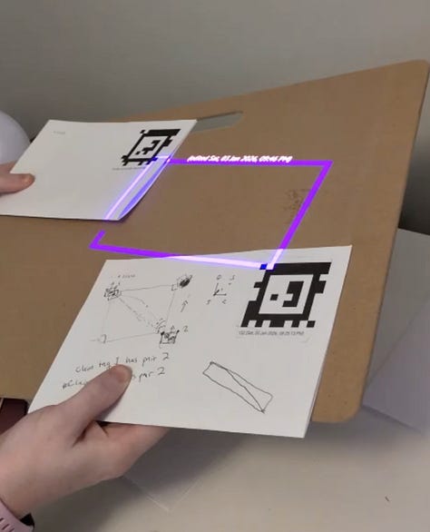 Photos of people around projectors and augmented pieces of paper from the Folk studio