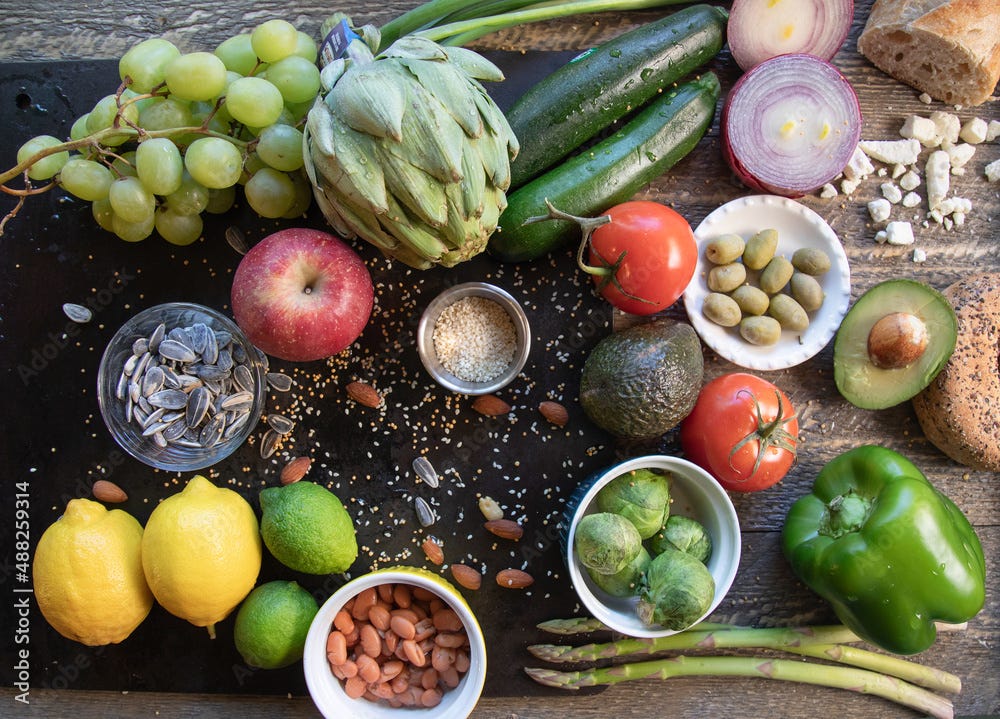 Mediterranean Diet food displayed on natural surfaces top view
