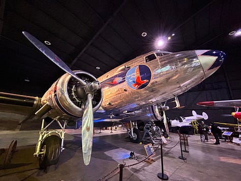 displays, exhibits, signs, planes