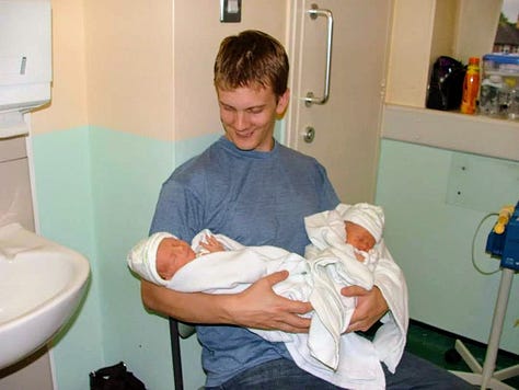 A six-photo collage documenting the early weeks after the birth of my twin sons. The images include one baby wrapped in a hospital towel, another receiving breathing support in neonatal intensive care, me holding both babies shortly after birth, their father cradling both twins, my mum cuddling one of the babies in hospital, and my dad holding one of the twins in intensive care. The gallery captures both the trauma of a difficult start to life and the constant presence of loving family members who surrounded and supported us throughout.