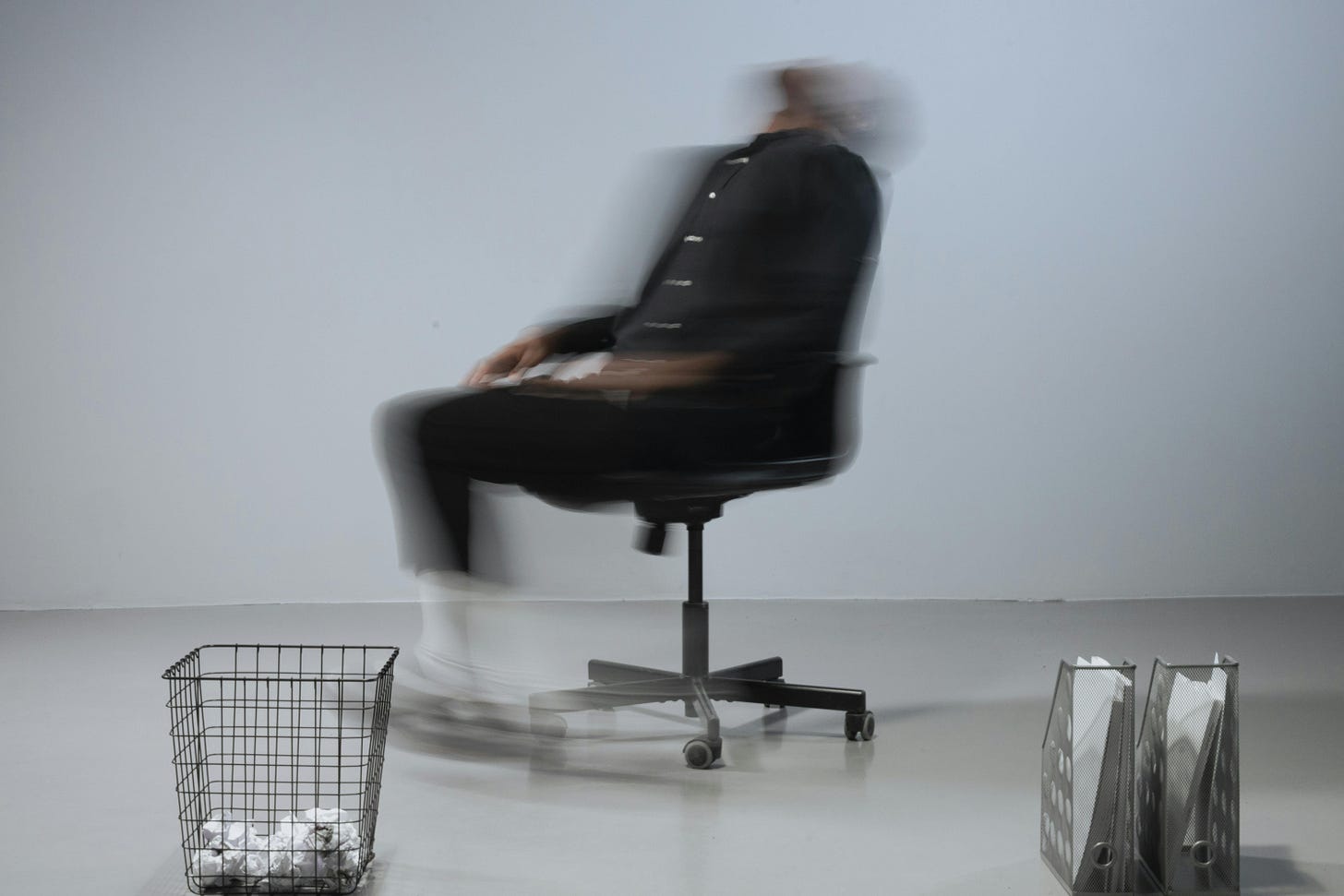 Photo by cottonbro studio: https://www.pexels.com/photo/blurred-photo-of-a-man-sitting-on-an-office-chair-9065101/