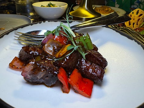 Xu decor plus the banana brûlée, Xu Cherry Wood Peking Duck and the pepper beef tenderloin.