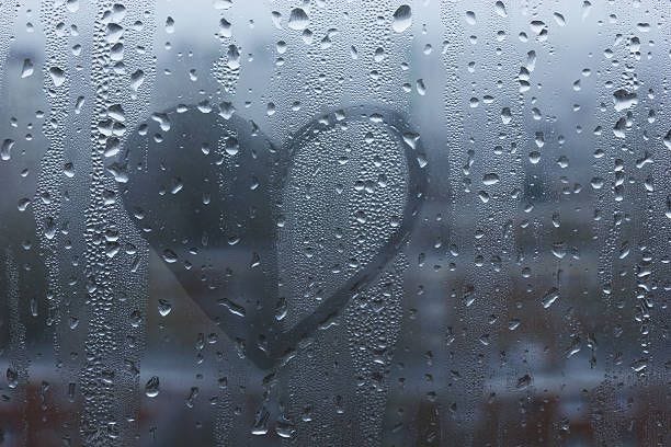 Symbol of love Symbol of love. Heart painted on glass heart on misted window stock pictures, royalty-free photos & images