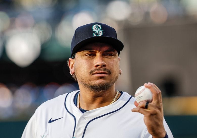 Seattle Mariners first baseman Josh Naylor looks to toss a ball to a fan before a game against the Chicago White Sox, Wednesday, Aug. 6, 2025 in Seattle. (Dean Rutz / The Seattle Times) Seattle Mariners first baseman Josh Naylor looks to toss a ball to a fan before a game against the Chicago White Sox, Wednesday, Aug. 6, 2025 in Seattle. (Dean Rutz / The Seattle Times)