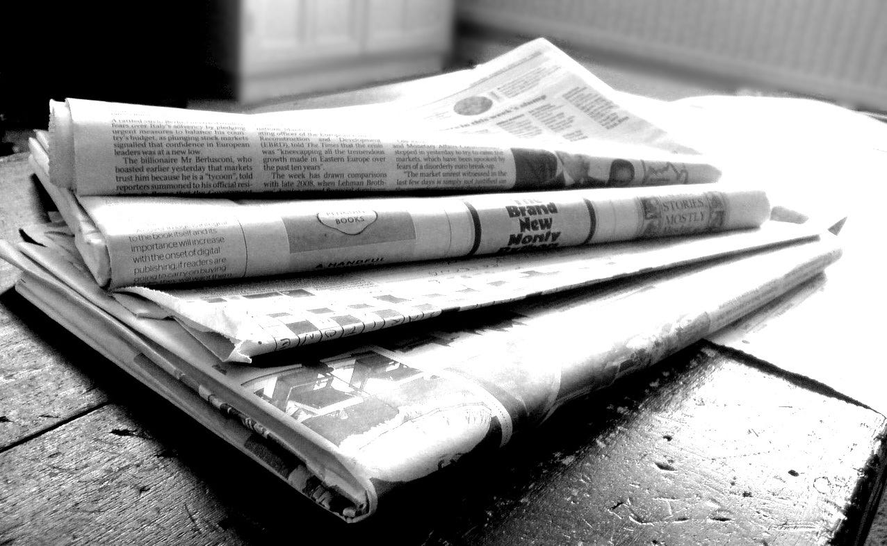 Folded newspapers Folded newspapers