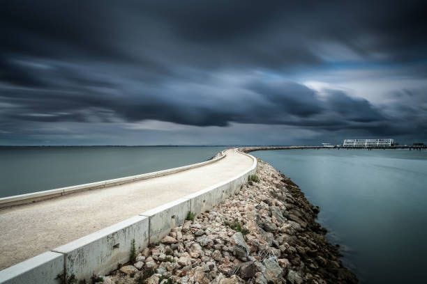 follow the storm - causeway stock pictures, royalty-free photos & images