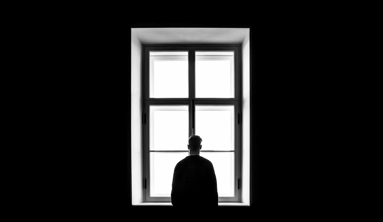 Man standing in front of mirror. Man standing in front of mirror.