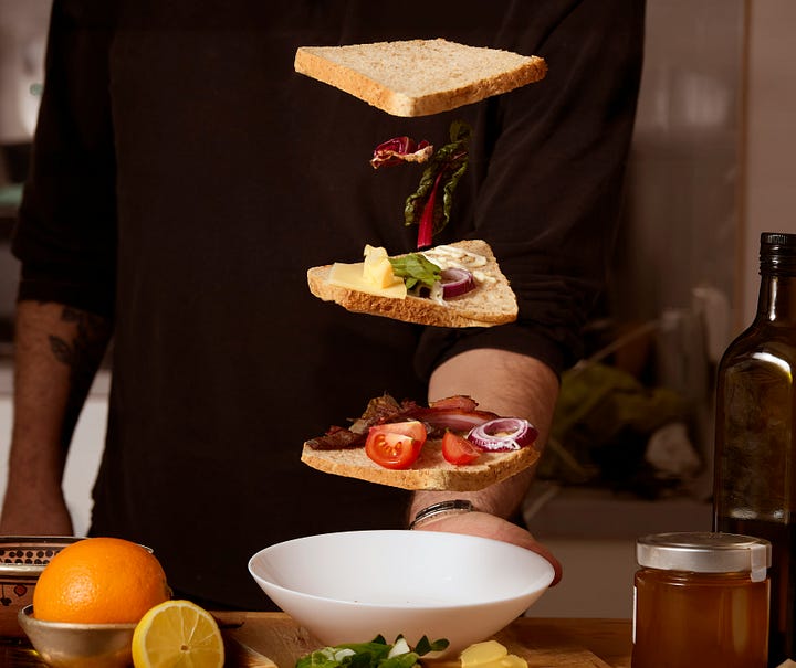 Sandwich coming together. Bread, meat and cheese with olives. Photos by Marco Palumbo and David B. Townsend via Unsplash