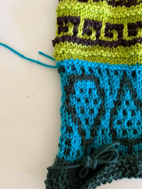 blue and green knitted item edges
