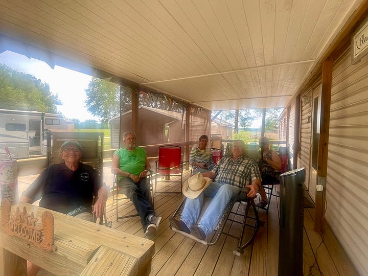 My photo of the group waiting on the Martin's deck waiting for Bill's arrival and Sandy when she moved to the railing to keep an eye out.