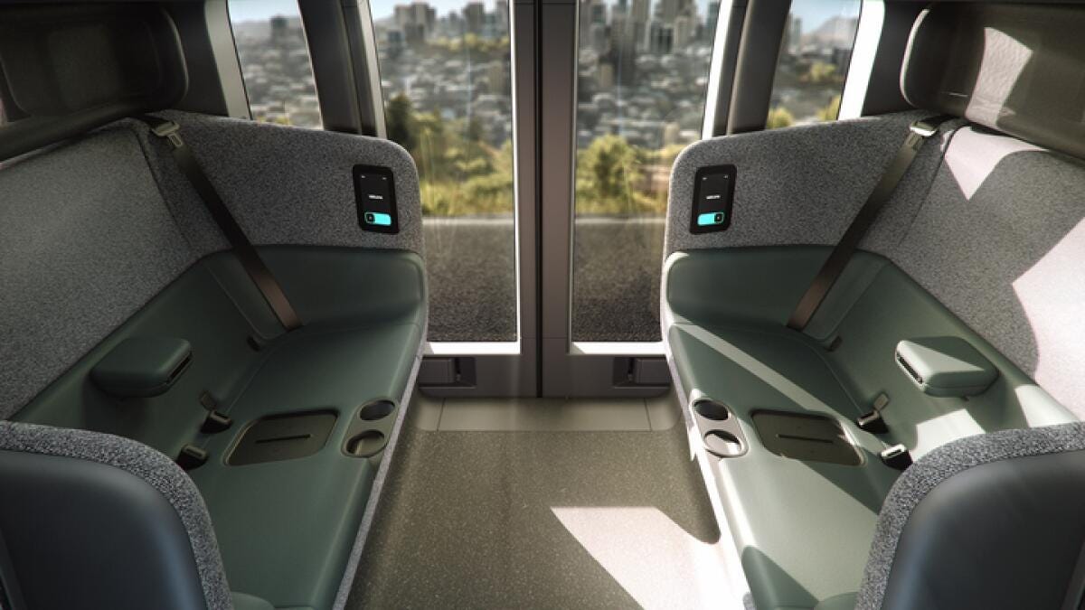 The autonomous vehicle is boarded through sliding doors.