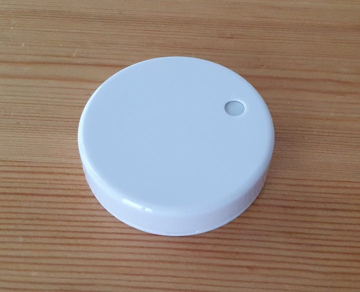 RuuviTag with and without the cover