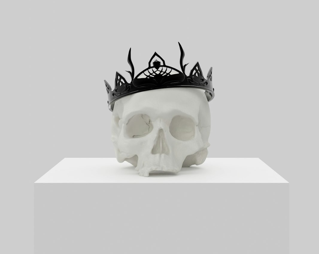a skull with a crown on top of it a skull with a crown on top of it