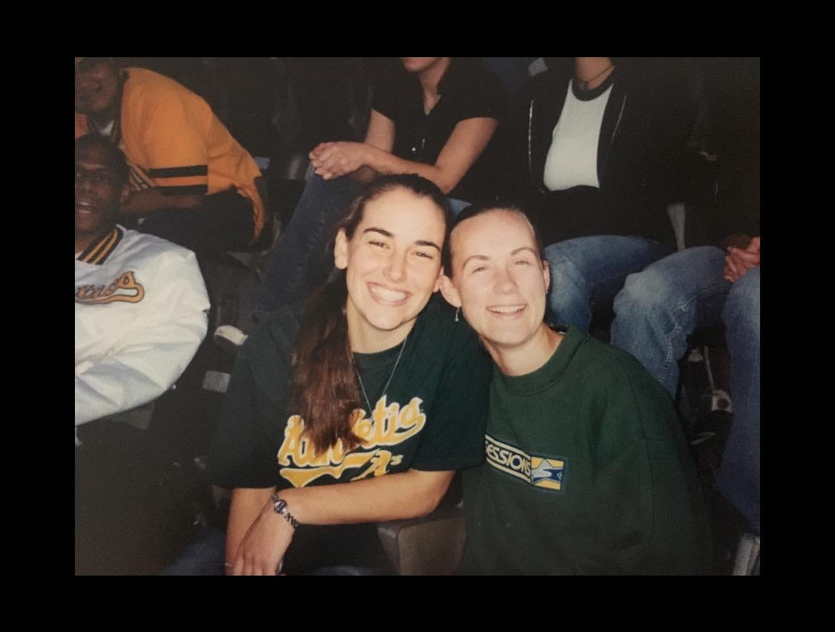 two women at a A's baseball game