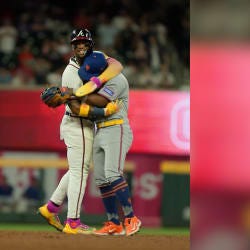 Acuña brothers embrace on field Acuña brothers embrace on field