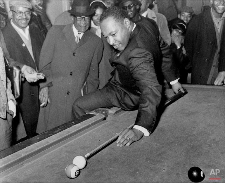 r/OldSchoolCool - Martin Luther King Jr. making a behind-the-back pool shot during a visit to a pool hall in Chicago, 1966