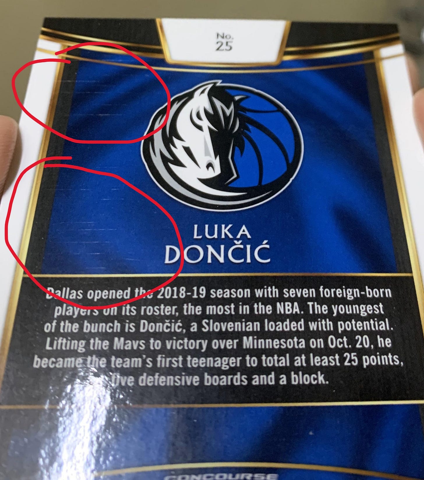 Example of back print lines for PSA grading on 2018 Luka Doncic Rookie Card. Example of back print lines for PSA grading on 2018 Luka Doncic Rookie Card.