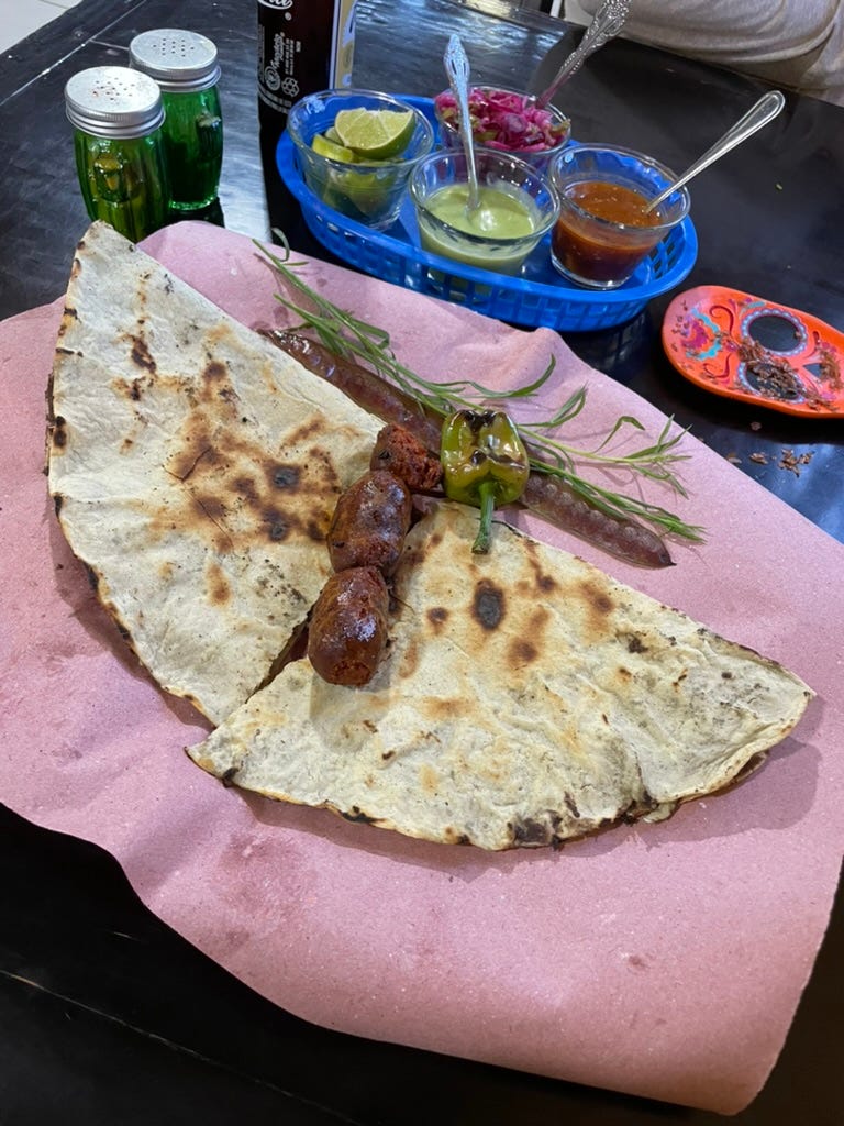 A tlayuda with chorizo.