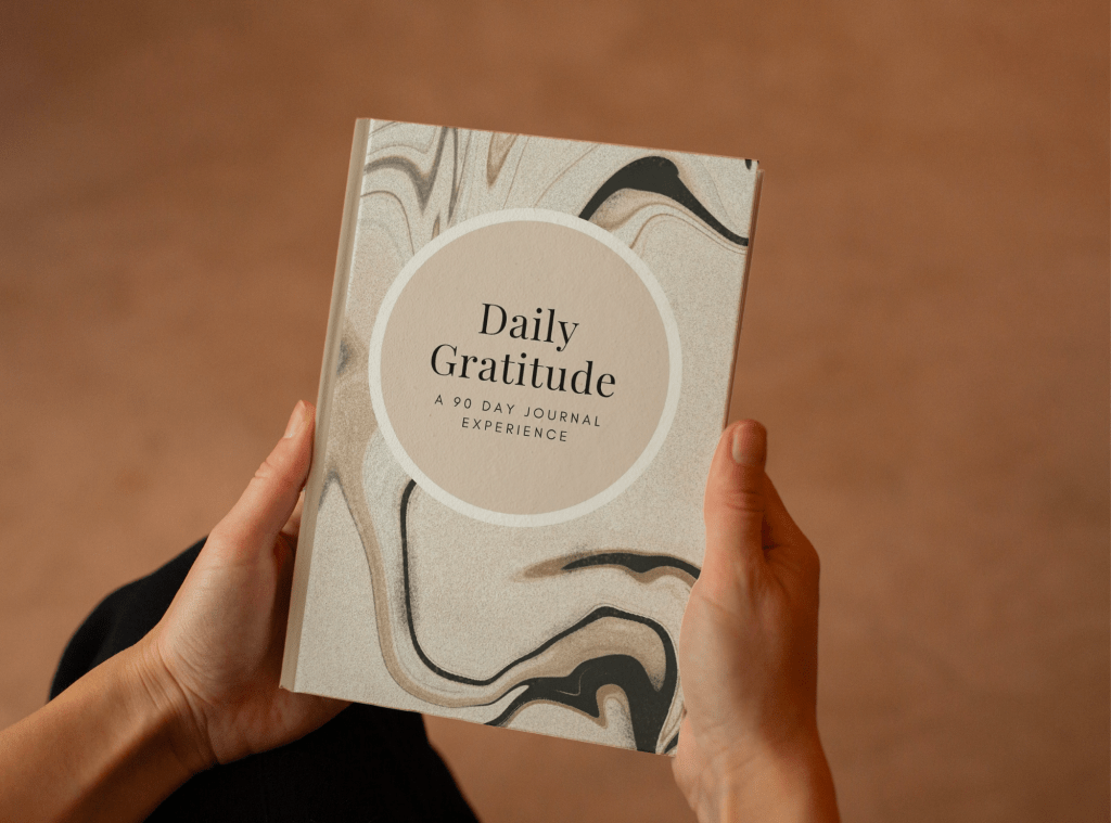 Person holding gratitude journal