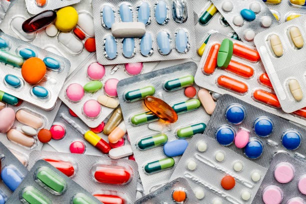 Background of a large group of assorted capsules, pills and blisters Health themes. Background of a large group of assorted capsules, pills and blisters. Drug abuse. medicine pharma stock pictures, royalty-free photos & images