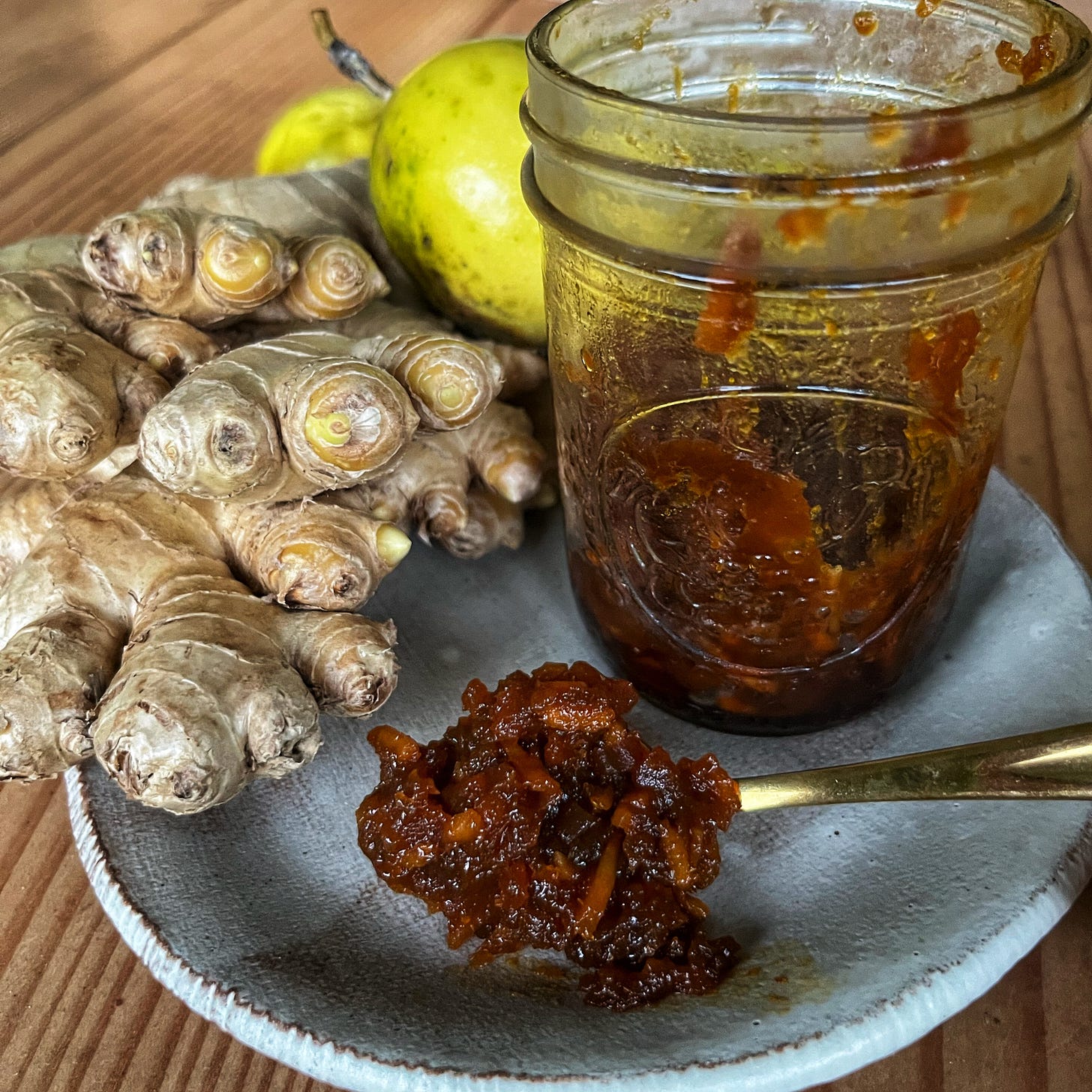 Liliko’i jelly with a jar, fresh ginger, and Liliko’i fruit