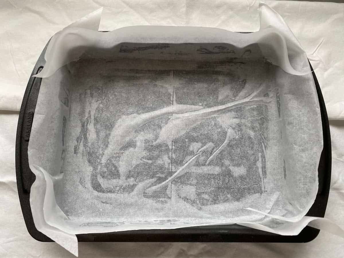 Traybake tin lined with parchment. Traybake tin lined with parchment.