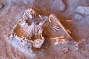 7,000-year-old natural mummy found at the Takarkori rock shelter (Individual H1) in Southern Libya.