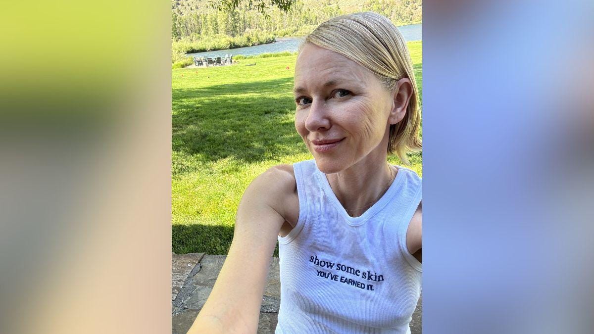 Image of Naomi Watts ditched her bra in a white tank top while snapping a recent selfie. Image of Naomi Watts ditched her bra in a white tank top while snapping a recent selfie.