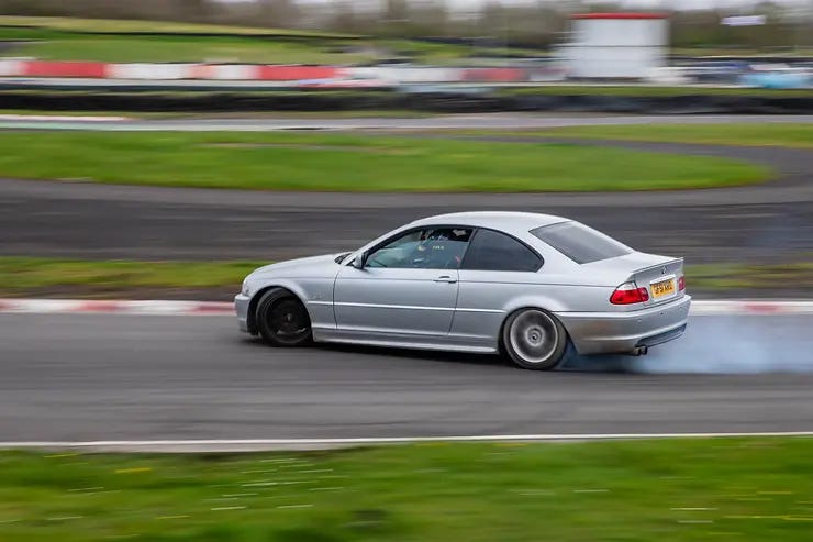 An image I managed to capture showing I achieved my hopes of getting a car drifting with smoke coming from the back tyres at Three Sisters Circuit, Wigan. April 2024. An image I managed to capture showing I achieved my hopes of getting a car drifting with smoke coming from the back tyres at Three Sisters Circuit, Wigan. April 2024.