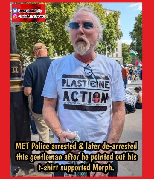 May be an image of 5 people and text that says "beardedchris O chris chrishthebeard beard PLASTICINE ACTION A AI NIEOPPOSEAIGENERATEDAMIATON NEOPPOSE AIGENERATED ANIMATION MET Police arrested & later de-arrested this gentleman after he pointed out his t-shirt supported Morph."